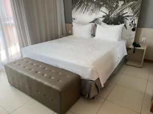 Postel nebo postele na pokoji v ubytování Flat Boulevard Side 2104 Altissimo Padrão com Lazer + 37 fotografií
