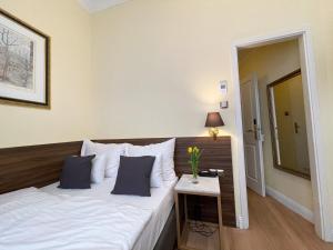 Letto o letti in una camera di Private Comfort STEPHANSPLATZ - SELF CHECK IN