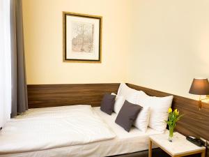 Letto o letti in una camera di Private Comfort STEPHANSPLATZ - SELF CHECK IN
