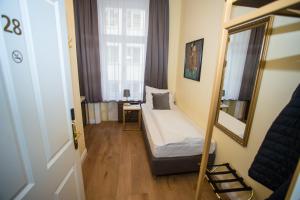 Letto o letti in una camera di Private Comfort STEPHANSPLATZ - SELF CHECK IN