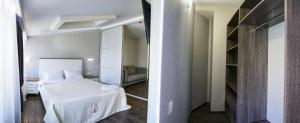 Кровать или кровати в номере Apart Hotel Kvartira 1