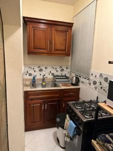 Dapur atau dapur kecil di Aileen Palm Cove Ja