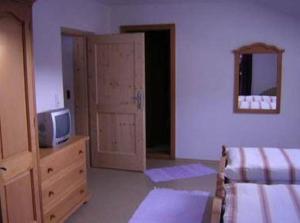 Letto o letti in una camera di Ferienwohnung Kirchbrücke