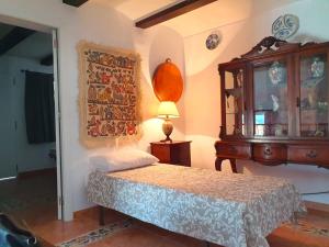 Łóżko lub łóżka w pokoju w obiekcie Evans Realty AL Villa & Piscina & Garaje & Playa