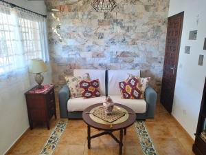 Część wypoczynkowa w obiekcie Evans Realty AL Villa & Piscina & Garaje & Playa