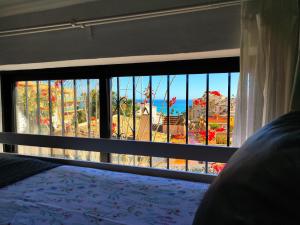 Łóżko lub łóżka w pokoju w obiekcie Evans Realty AL Villa & Piscina & Garaje & Playa