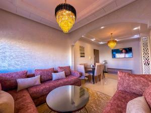 A seating area at LovelyStay - Luxury & proximity to Corniche and TGV