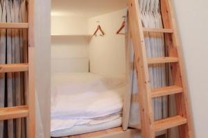 Postel nebo postele na pokoji v ubytování Hostel Wasabi Asakusa