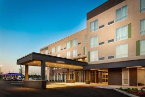 a rendering of the front of a hotel at Courtyard by Marriott Indianapolis West-Speedway in Indianapolis