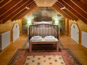 a bedroom with a bed in a attic at Seaton Cottage - Uk31990 in Staithes
