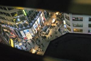 an overhead view of a busy city street at night at The Stay Hue Myeongdong in Seoul
