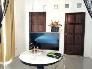 TV a/nebo společenská místnost v ubytování Mori Jonker Homestay