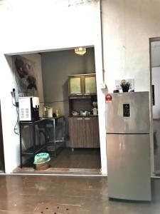 Kuchyň nebo kuchyňský kout v ubytování Mori Jonker Homestay