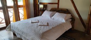 Postel nebo postele na pokoji v ubytování Villa Ester Hostel Vereda Cay