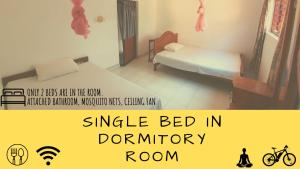 Letto o letti in una camera di Feel Like Home Anuradhapura