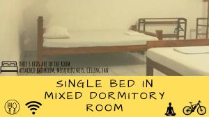 Letto o letti in una camera di Feel Like Home Anuradhapura