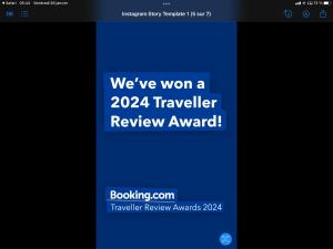 a screenshot of a travel review app on a phone at GREAT PARIS, private parking and balcony, 24 hours self checking, near Stade de France in Bondy