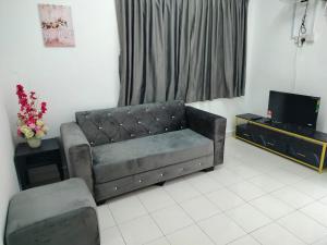 TV a/nebo společenská místnost v ubytování CMN Hotel & Homestay