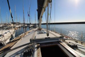 a view of the bow of a boat in the water at blu in Cagliari +5 photos