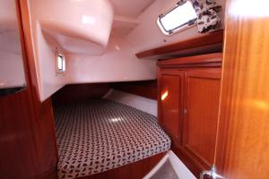 a small room with a seat in the back of a boat at blu in Cagliari