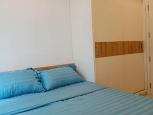 Llit o llits en una habitació de Big Promotion SECC Luxury 2-Bedrooms Apartment, FV Hospital, Cresent Mall