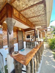 Balkon atau teras di Panagsama Holiday Cottage