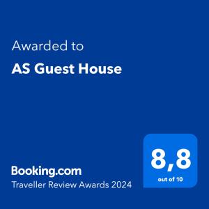 a screenshot of a guest house with the text awarded to as guest house at AS Guest House in Libreville