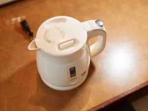 Tetera y cafetera en Tabist Hotel New Central