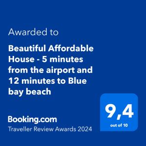 Et logo, certifikat, skilt eller en pris der bliver vist frem på Beautiful Affordable House - 5 minutes from the airport and 12 minutes to Blue bay beach