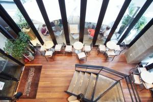 an overhead view of a room with chairs and tables at Jerry's Planet in Seoul