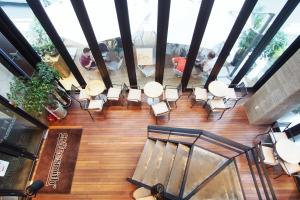 an overhead view of a room with chairs and tables at Jerry's Planet in Seoul