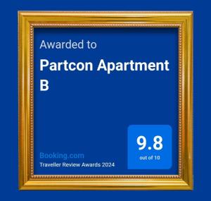 a picture frame with the text awarded to parron apartment b at Partcon Apartment B in Neoi Epivates