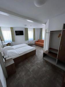 Postel nebo postele na pokoji v ubytování Hotel Meyer
