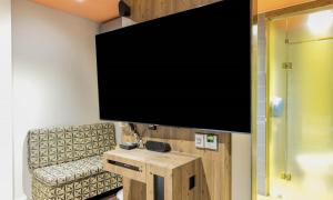 TV a/nebo společenská místnost v ubytování Dongtan BobosHotel