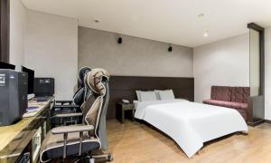 TV a/nebo společenská místnost v ubytování Dongtan BobosHotel