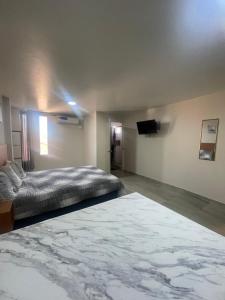 Postel nebo postele na pokoji v ubytování Apartamentos AEROPUERTO