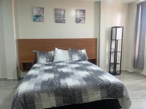 Postel nebo postele na pokoji v ubytování Apartamentos AEROPUERTO