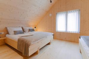 Postel nebo postele na pokoji v ubytování PIRA HOTEL