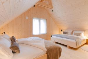 Postel nebo postele na pokoji v ubytování PIRA HOTEL