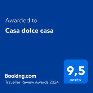 a blue screen with the text awarded to casa dolce casa dossier at Casa dolce casa in Viareggio