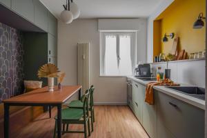 Kuchyň nebo kuchyňský kout v ubytování Depero di TSS' - Nuova Sauna infrared, FREE Parking, vicino al MART, Supermercato, Ristoranti + 15 fotografií