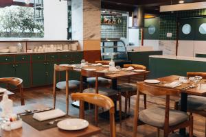 Restoran või mõni muu söögikoht majutusasutuses Hotel Shambala