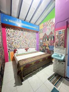 Letto o letti in una camera di Pelemkecut Double-Degree Syariah Accommodation
