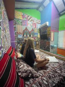 Letto o letti in una camera di Pelemkecut Double-Degree Syariah Accommodation