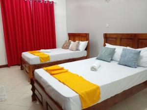 Säng eller sängar i ett rum på 3 Bedroom Apartment In Nyali-Mombasa- Baraka Suites