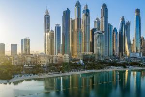 a view of a city with tall buildings at The Westin Dubai Mina Seyahi Beach Resort and Waterpark in Dubai