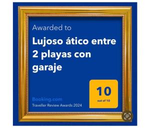 a picture of a gold picture frame with the text awarded to luxos africa at Lujoso ático entre 2 playas con garaje in Gijón