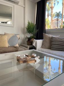 Posedenie v ubytovaní Apartamento Torre Yago primera linea playa Benidorm con Wi-Fi & AC