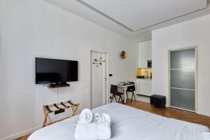 Krevet ili kreveti u jedinici u okviru objekta Apartment Bastille Le Marais by Studio prestige