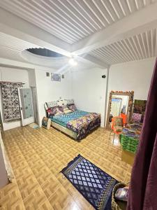 Letto o letti in una camera di Pelemkecut Double-Degree Syariah Accommodation